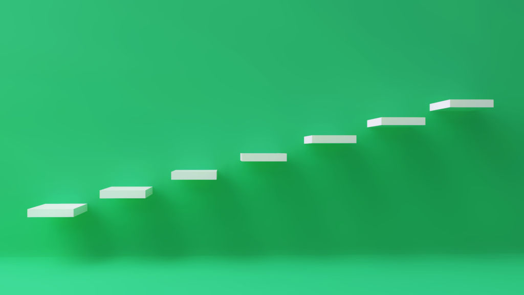 An image of floating white steps ascending left to right on a bright green background